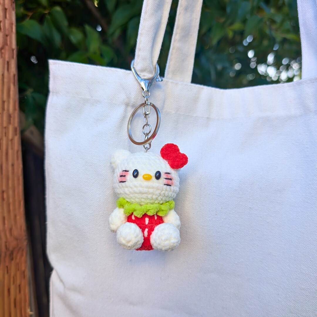 Strawberry Kitty Crochet Plush Keychain | Kawaii Soft Cartoon Characters Bag Charm | Anime Cat Toy Gifts | MakerPlace by Michaels Strawberry Kitty Crochet Plush Keychain | Kawaii Soft Cartoon Characters Bag Charm | Anime Cat Toy Gifts | MakerPlace by Michaels